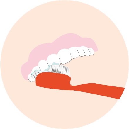 Brushing dentures